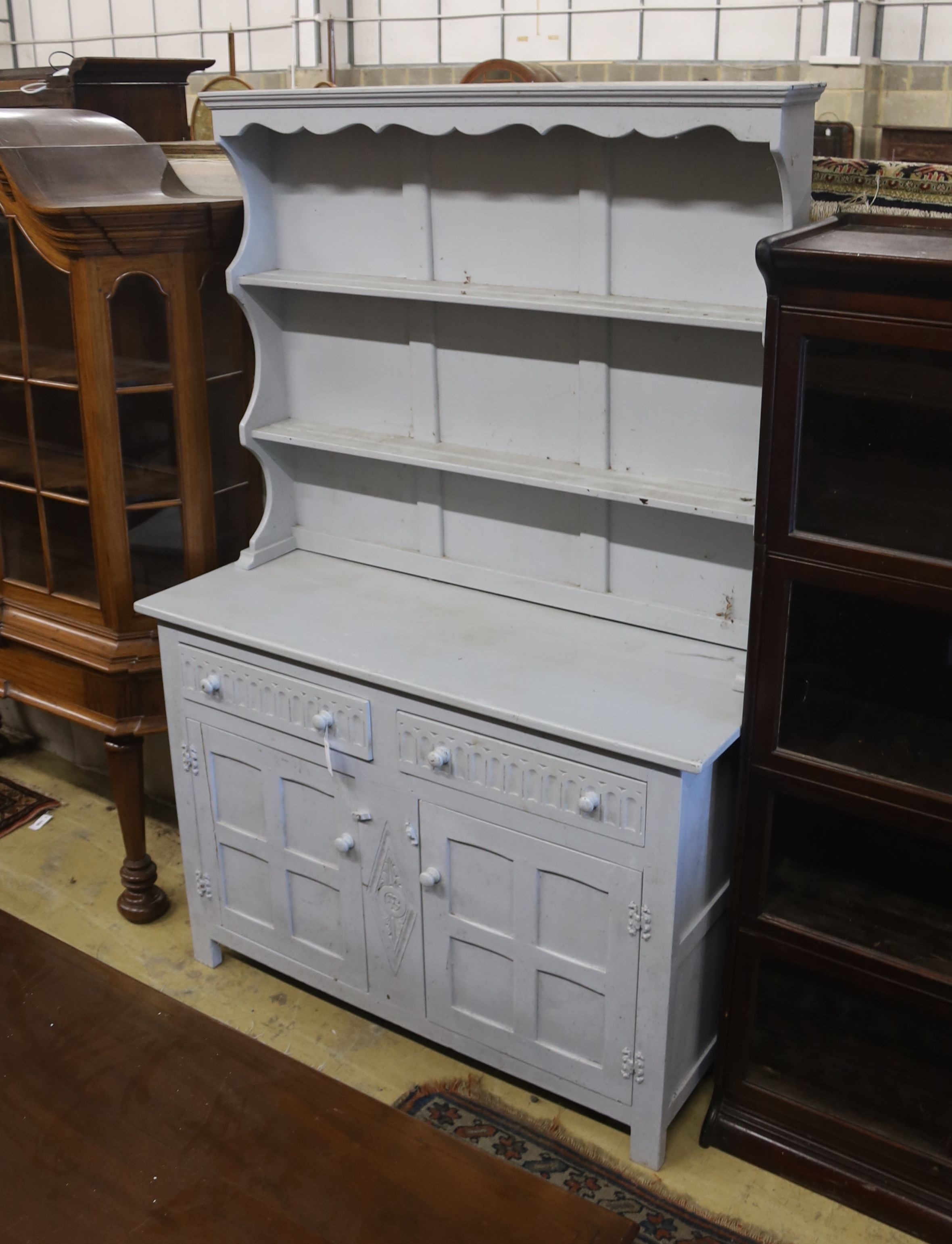 An early 20th century later painted oak dresser, length 130cm, depth 47cm, height 193cm